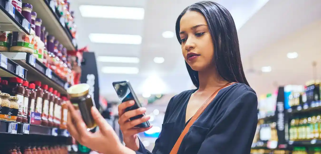 a woman holding a new product