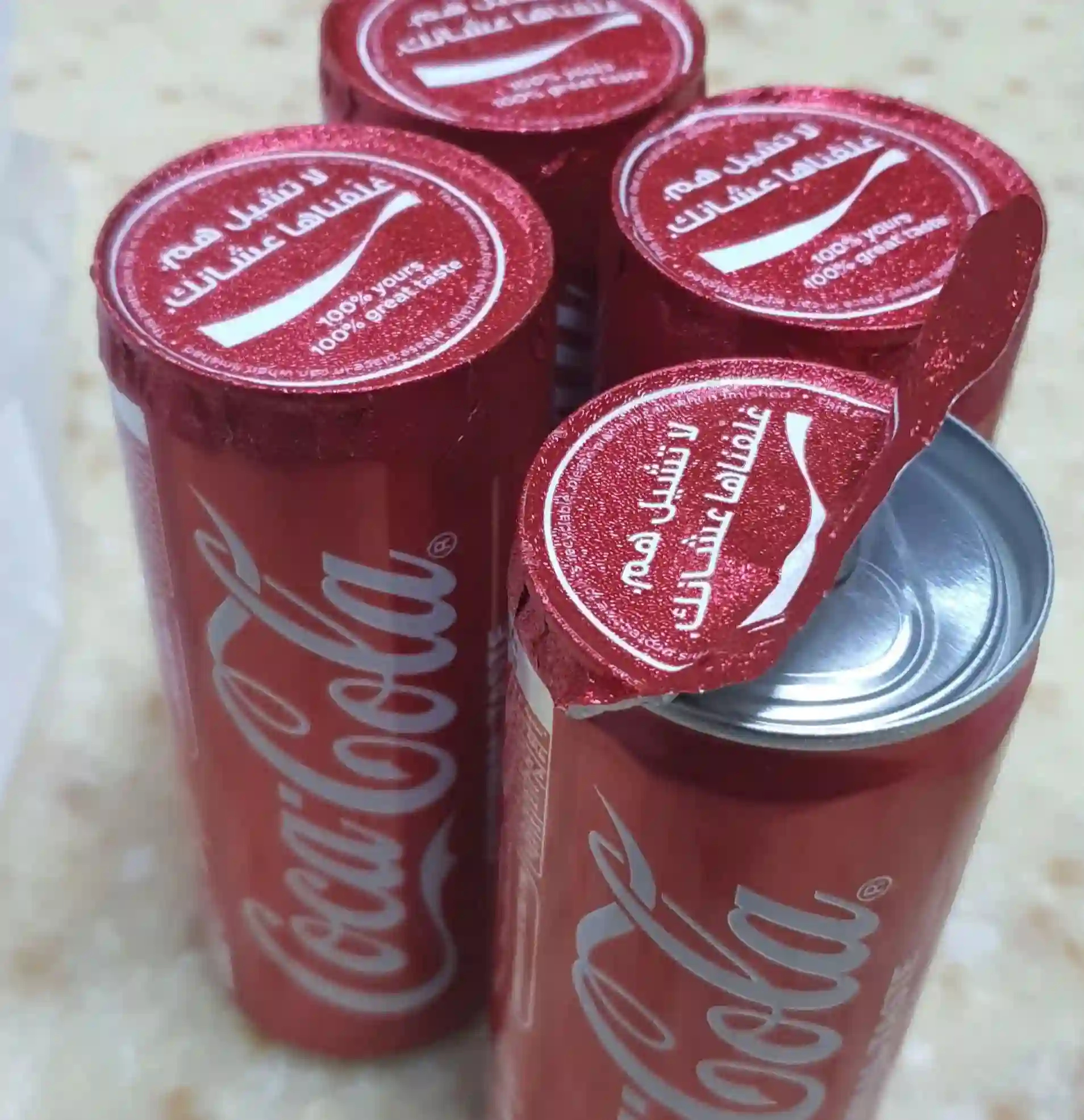 Coca-Cola cans with a protective lid in Saudi Arabia